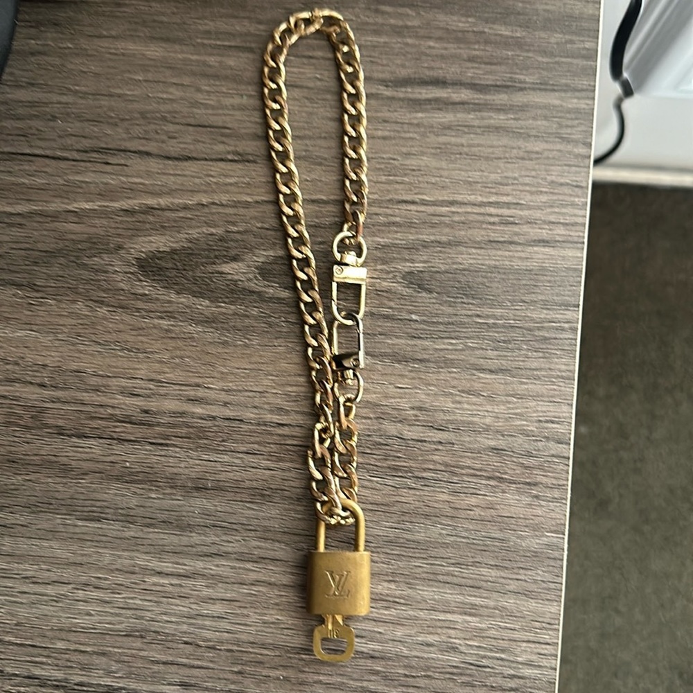 Authentic Louis Vuitton padlock with key
